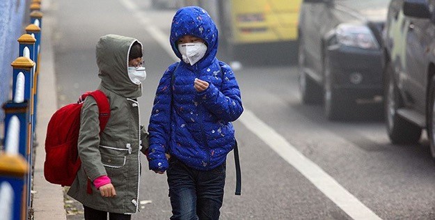 two children street smog cars city